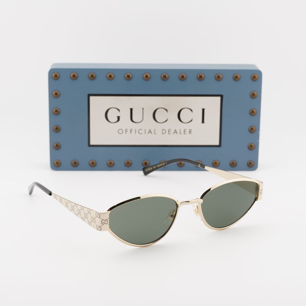 Gucci GG1853S 001 Oval Sunglasses – Gold/Grey